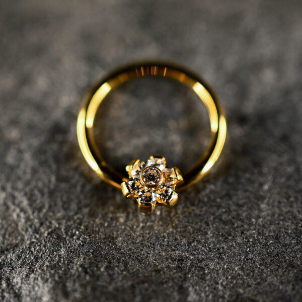 Anneau Clicker Titane Doré Fleur