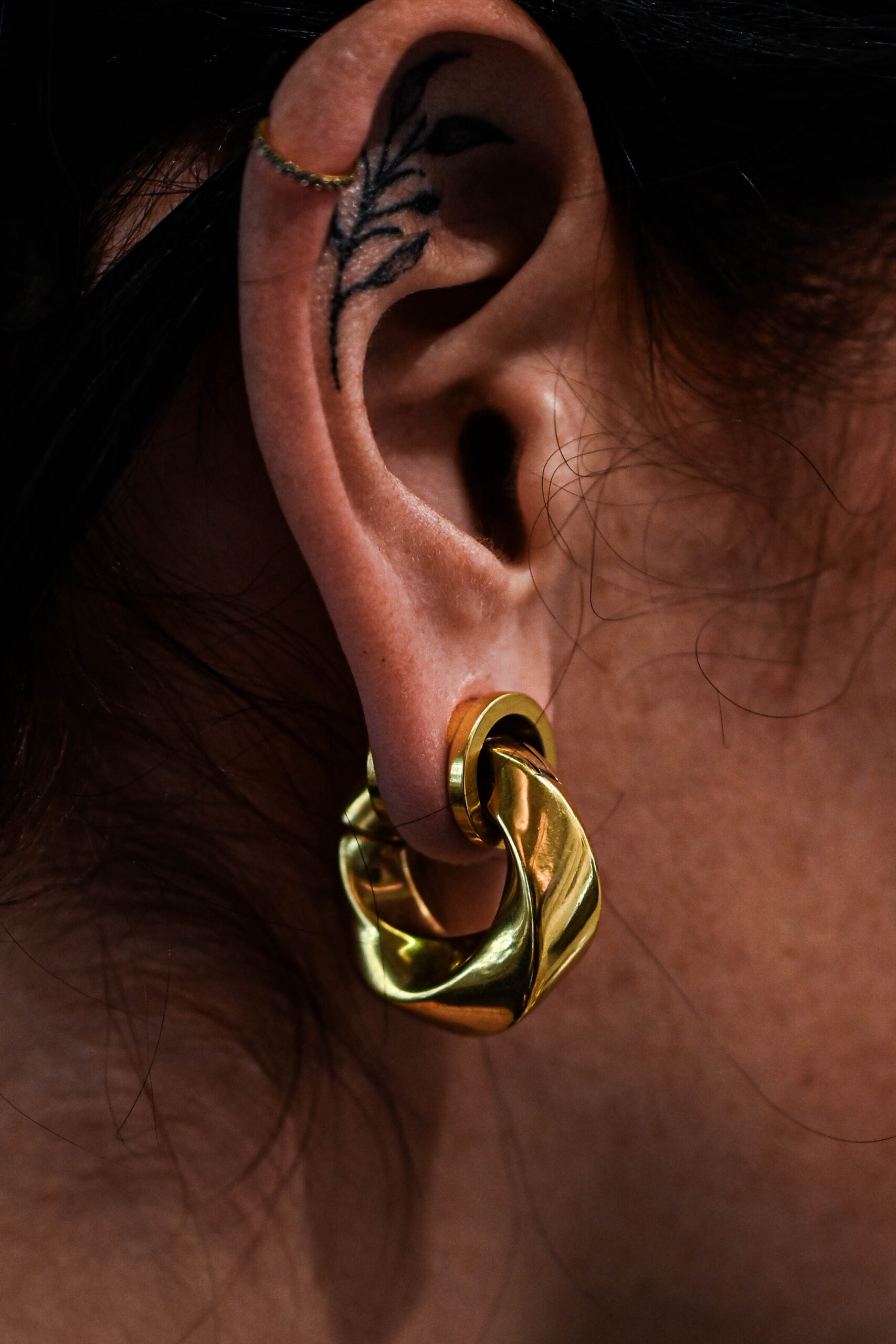 Poids d'oreille doré Éclipse