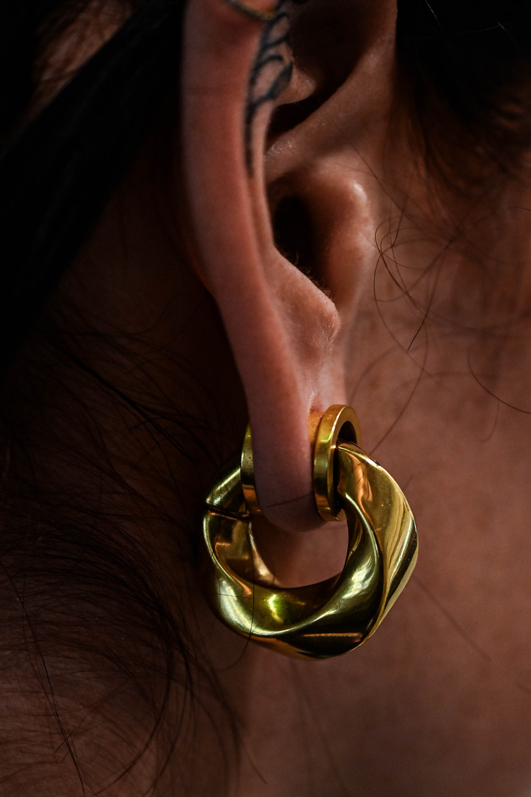 Poids d'oreille doré Éclipse